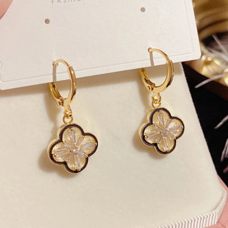 Yupsk Exquisite Elegant Copper Zircon Four-Leaf Flower Dangle Earrings for Women Girls Golden Anniversary Birthday Jewelry